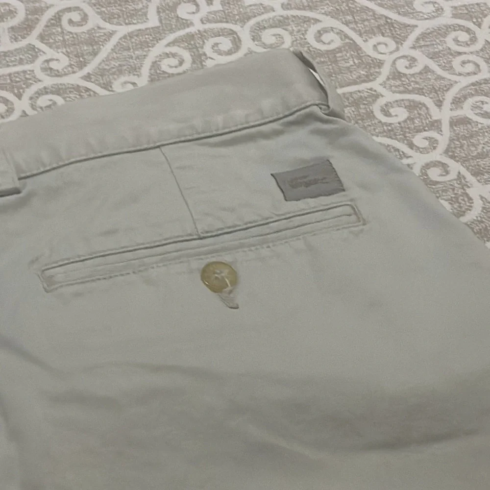 mens lacoste pleated shorts sz 34
